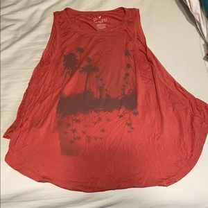 Two graphic soft and sexy tanks